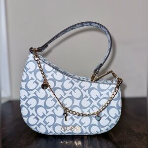 Light Pastel Blue Guess Saddle Shoulder Bag with Charm Chain